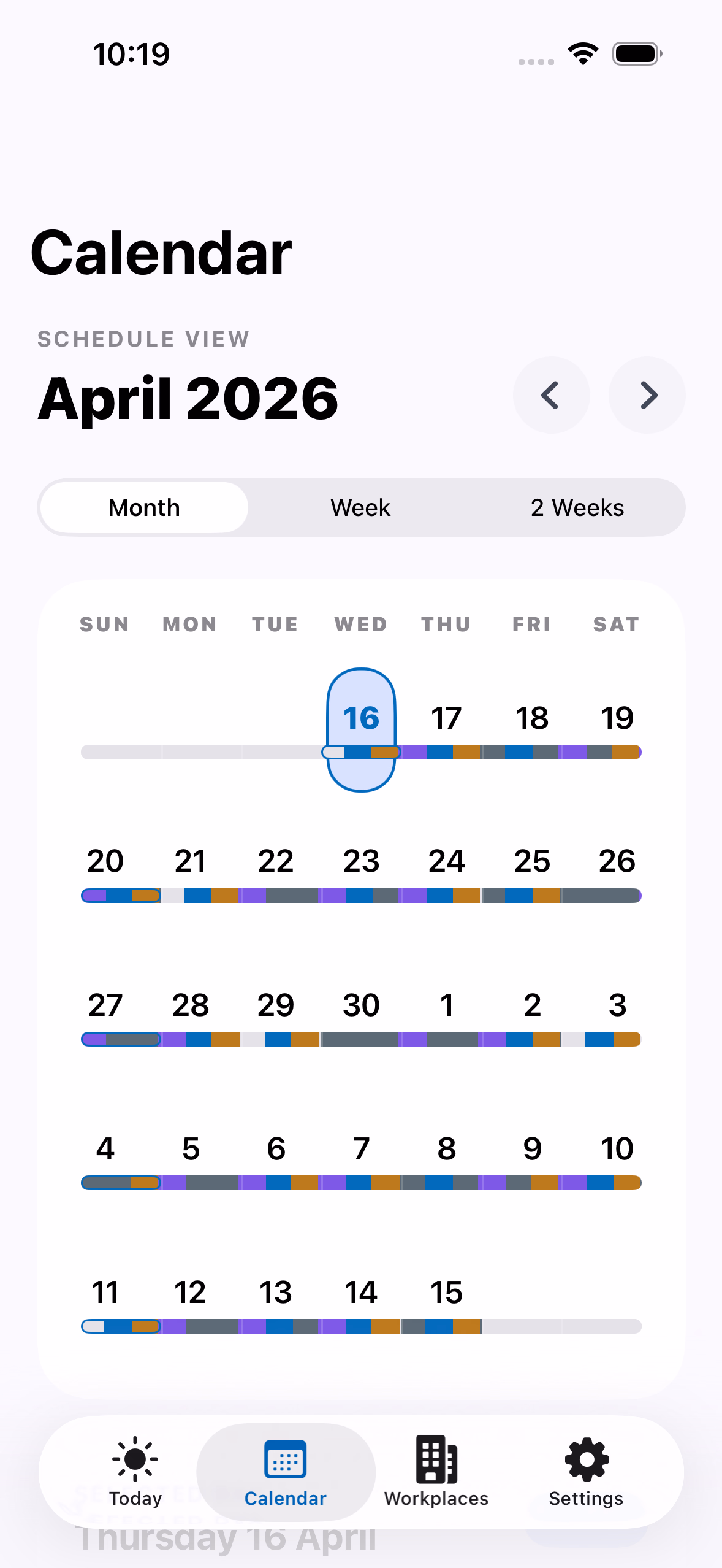 RosterEase calendar view showing a month of color-coded shifts.